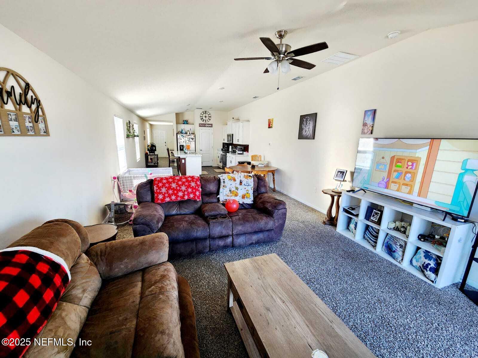 2432 Falling Star Ln Green Cove Springs Green Cove Springs, FL 32043 - Photo 17 of 24 a living room with furniture and furniture