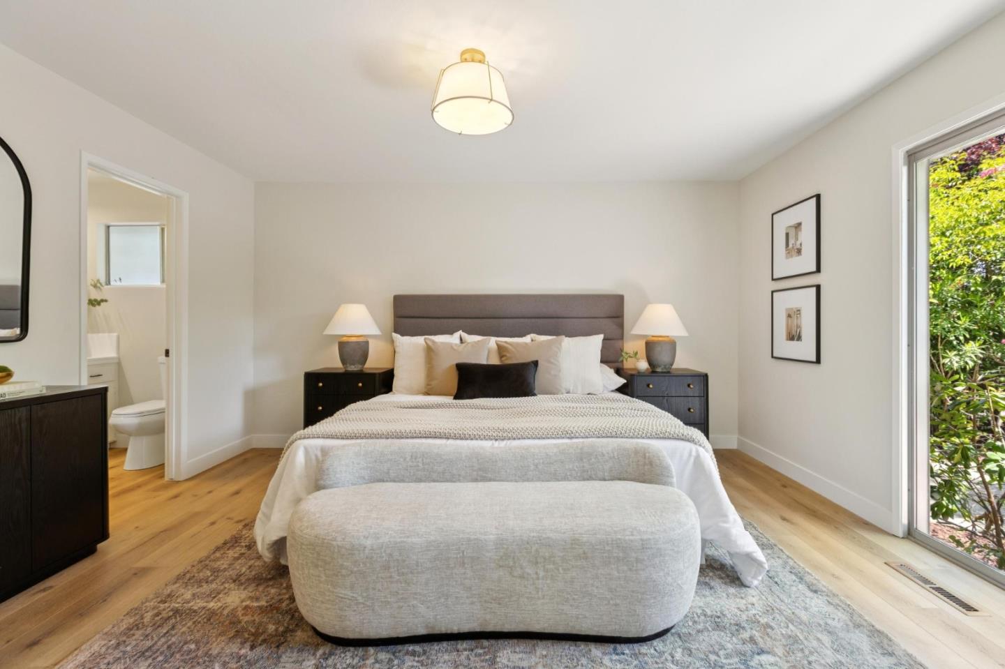 755 Santa Rita Avenue Los Altos, CA 94022 - Photo 30 of 50 a bedroom with a bed and wooden floor