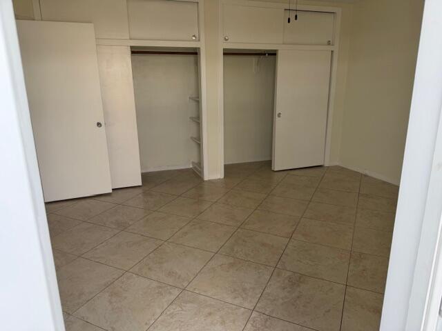 3801 Northeast 22nd Terrace, Unit 12 Lighthouse Point, FL 33064 - Photo 12 of 14 an empty room with a bathroom