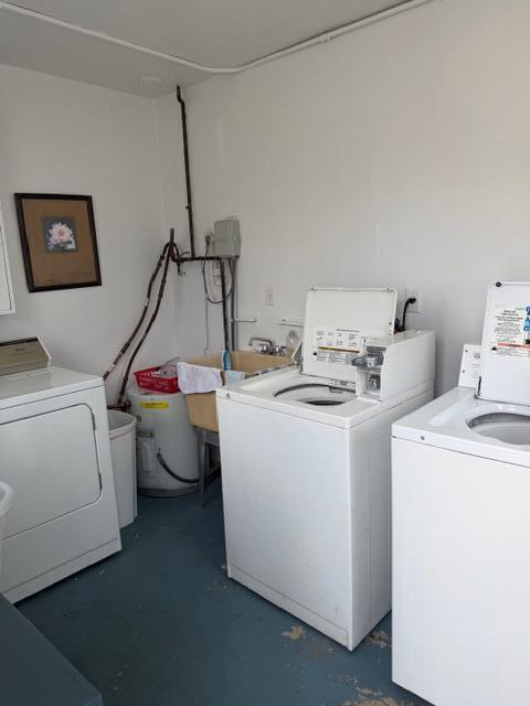 3801 Northeast 22nd Terrace, Unit 12 Lighthouse Point, FL 33064 - Photo 14 of 14 a utility room with dryer and washer