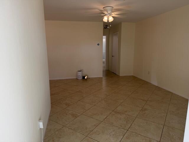 3801 Northeast 22nd Terrace, Unit 12 Lighthouse Point, FL 33064 - Photo 8 of 14 an empty room with a bathroom