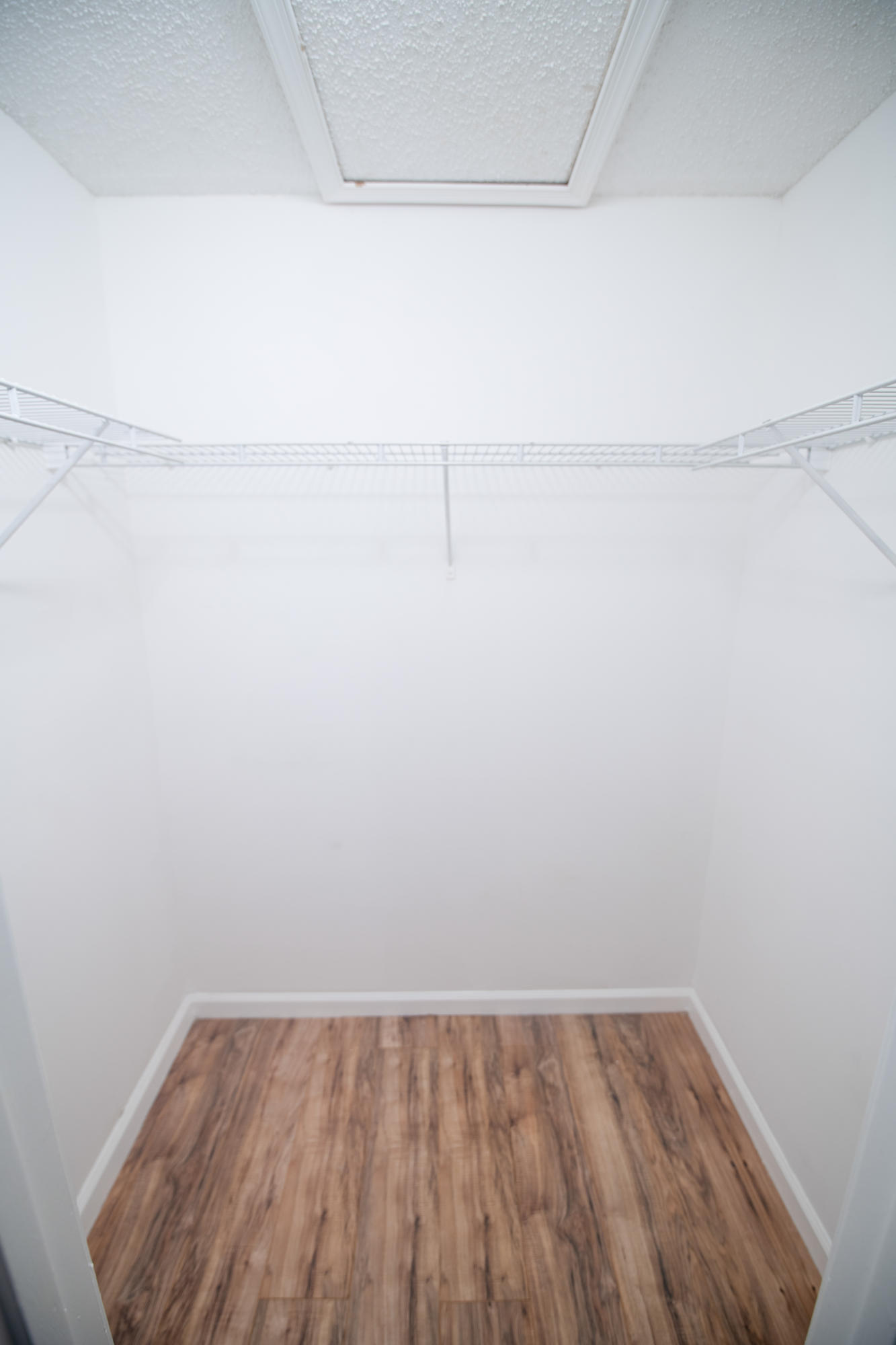 1165 Crystal Way, Unit B Delray Beach, FL 33444 - Photo 16 of 27 a view of a room with racks on the wall