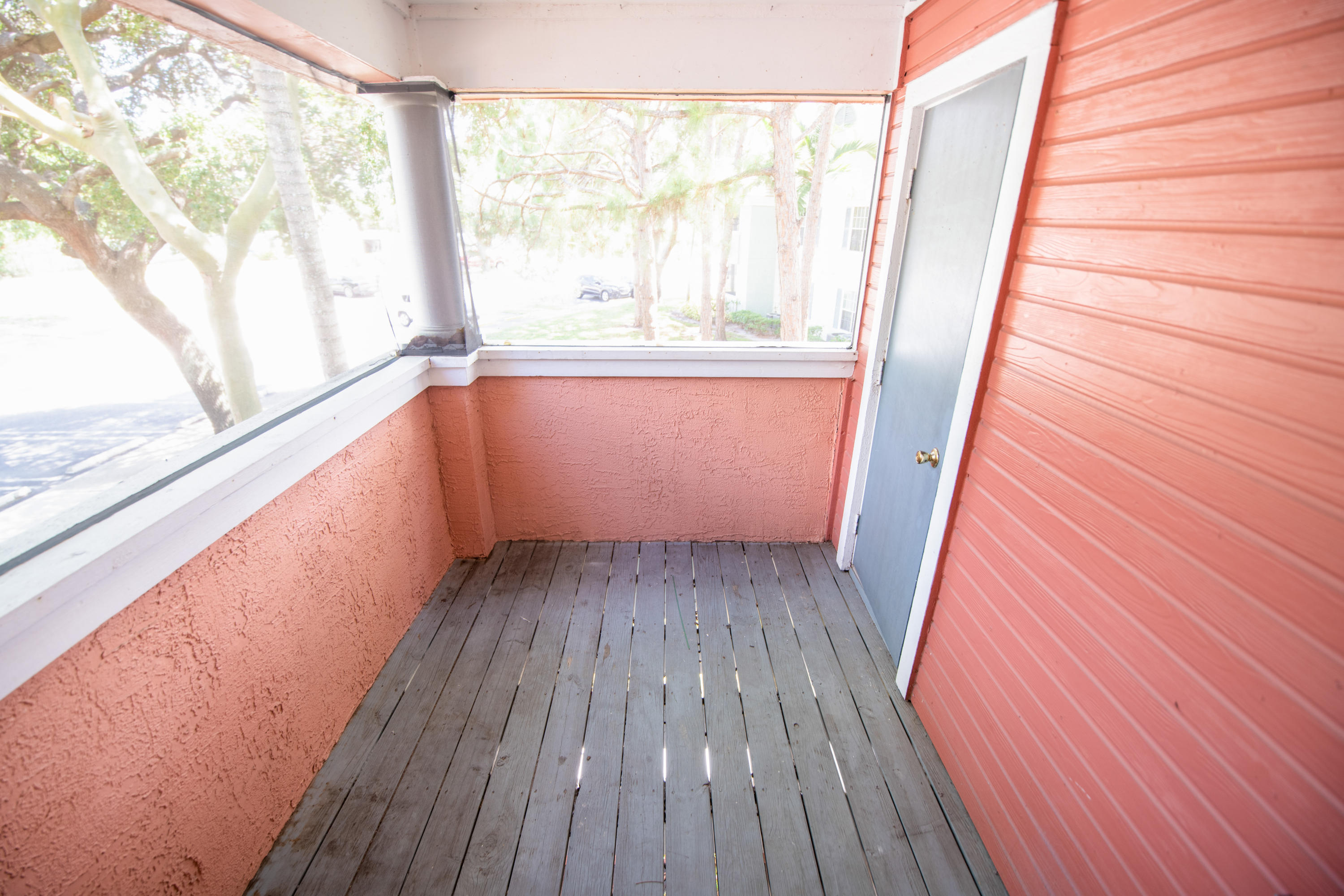 1165 Crystal Way, Unit B Delray Beach, FL 33444 - Photo 19 of 27 a view of wooden floor in a room next to a window