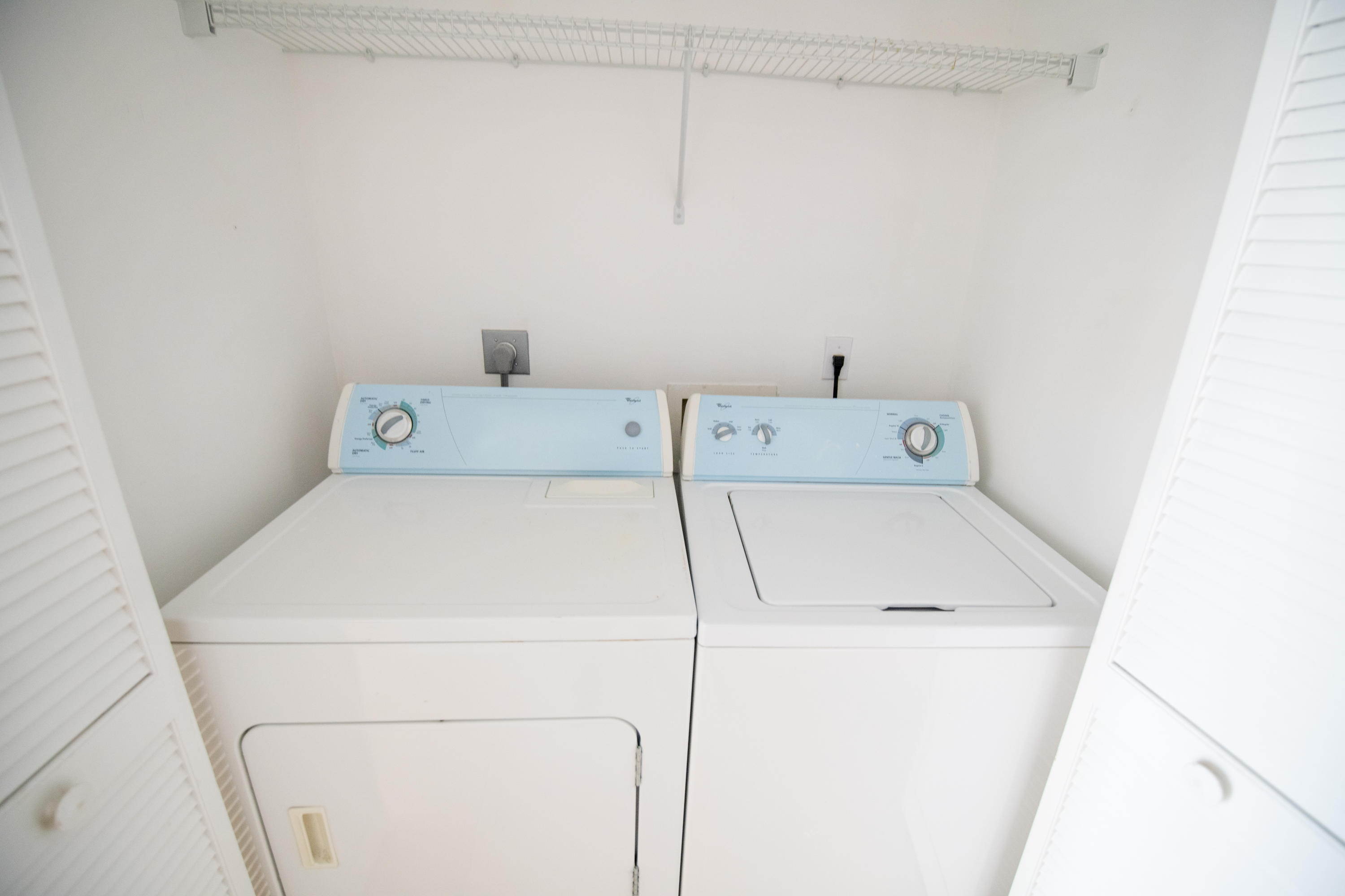 1165 Crystal Way, Unit B Delray Beach, FL 33444 - Photo 20 of 27 a utility room with dryer and washer