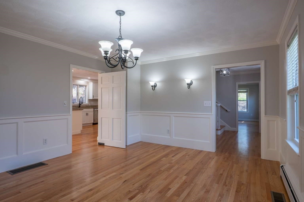120 Bear Hill Road North Andover, MA 01845 - Photo 11 of 42 a view of a room with wooden floor