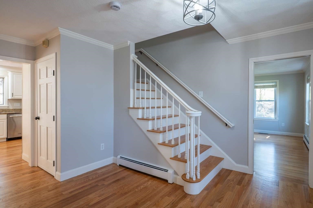 120 Bear Hill Road North Andover, MA 01845 - Photo 19 of 42 a view of entryway and hall with wooden floor