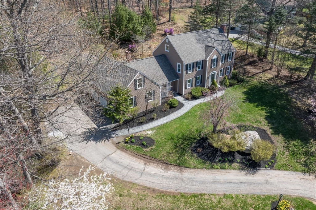 120 Bear Hill Road North Andover, MA 01845 - Photo 39 of 42 an aerial view of a house with a yard and large trees