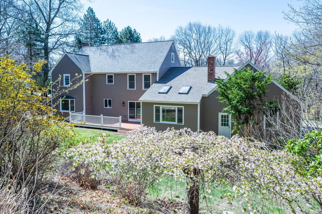 120 Bear Hill Road North Andover, MA 01845 - Photo 42 of 42 a front view of house with yard and trees
