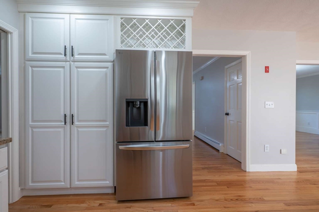 120 Bear Hill Road North Andover, MA 01845 - Photo 5 of 42 a kitchen with metallic refrigerator freezer and a dishwasher