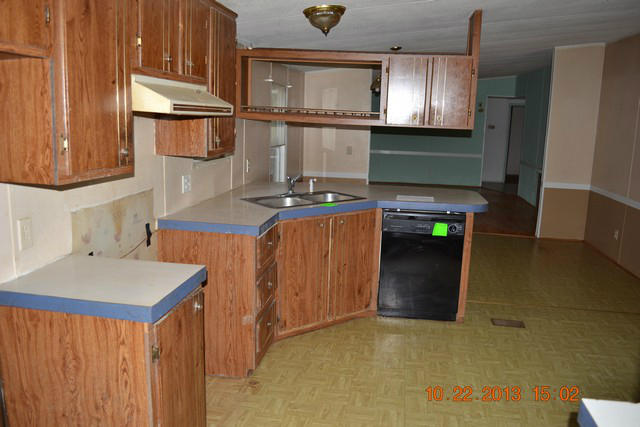 5151 Turners Creek Road Ferrum, VA 24088 - Photo 3 of 20 a kitchen with stainless steel appliances granite countertop a refrigerator a sink and a stove