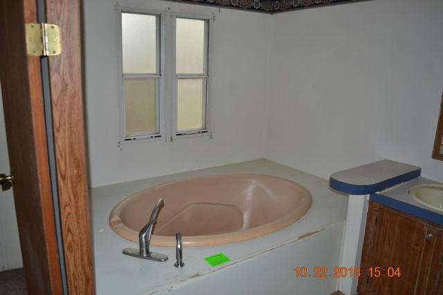 5151 Turners Creek Road Ferrum, VA 24088 - Photo 8 of 20 a bathroom with a tub and shower