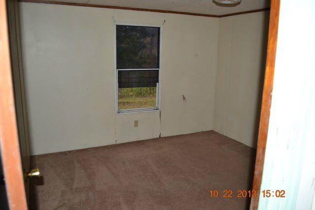 5151 Turners Creek Road Ferrum, VA 24088 - Photo 10 of 20 a view of an empty room with a window
