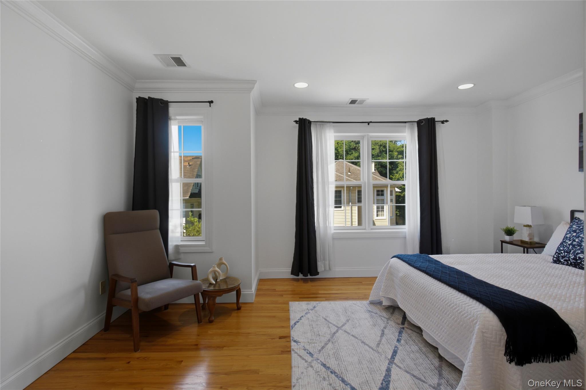 11 Prince Street, Unit C5 New Rochelle, NY 10801 - Photo 12 of 21 Spacious primary bedroom with ample closet space.