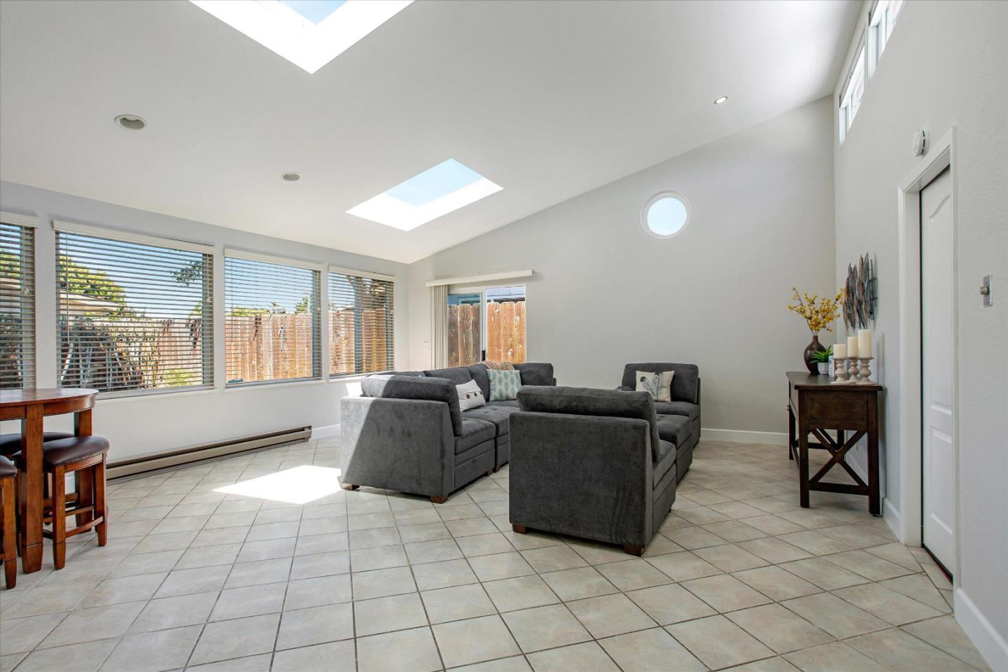 1001 Tweed Street Seaside, CA 93955 - Photo 11 of 35 a living room with furniture and a window