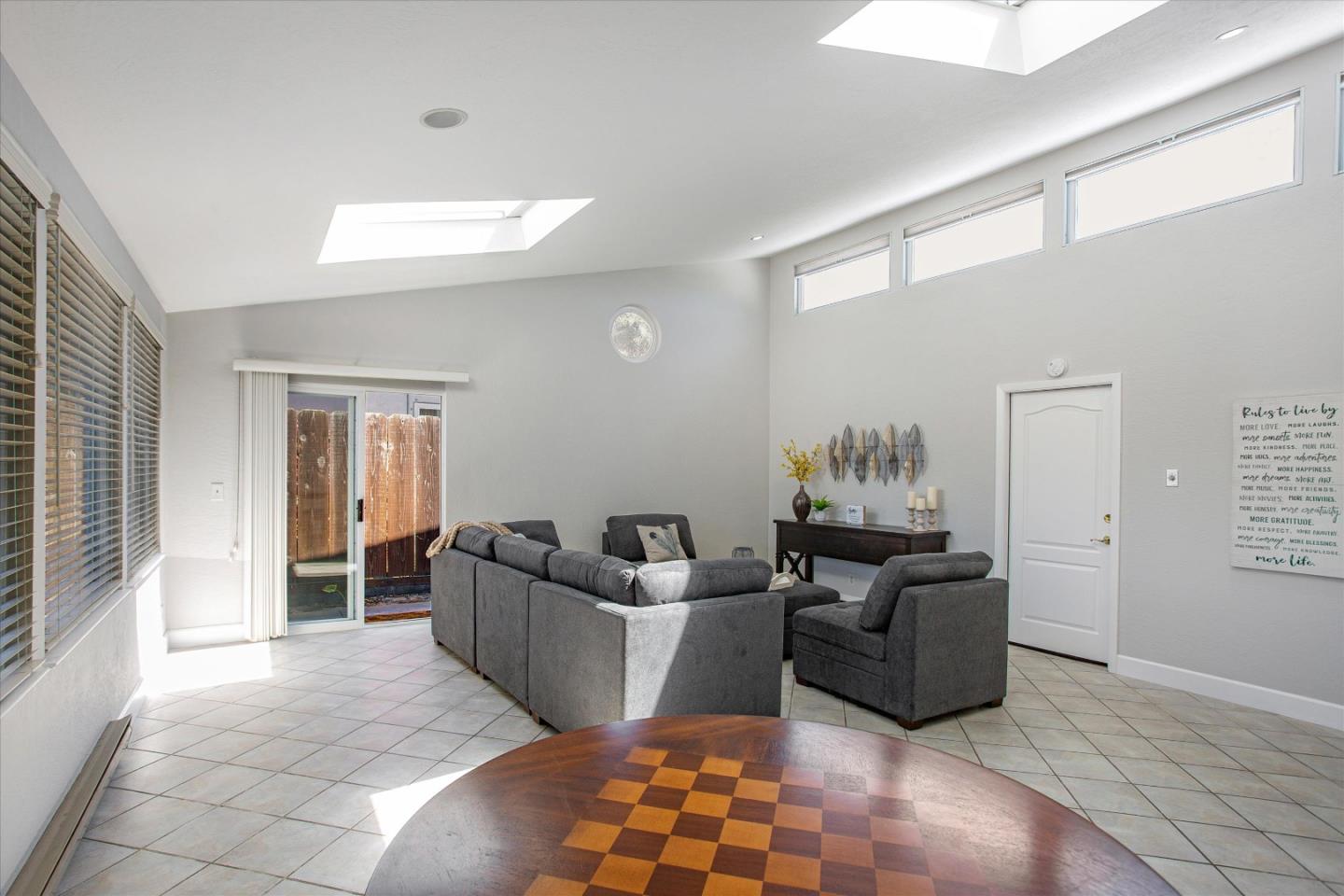 1001 Tweed Street Seaside, CA 93955 - Photo 12 of 35 a living room with furniture and a window