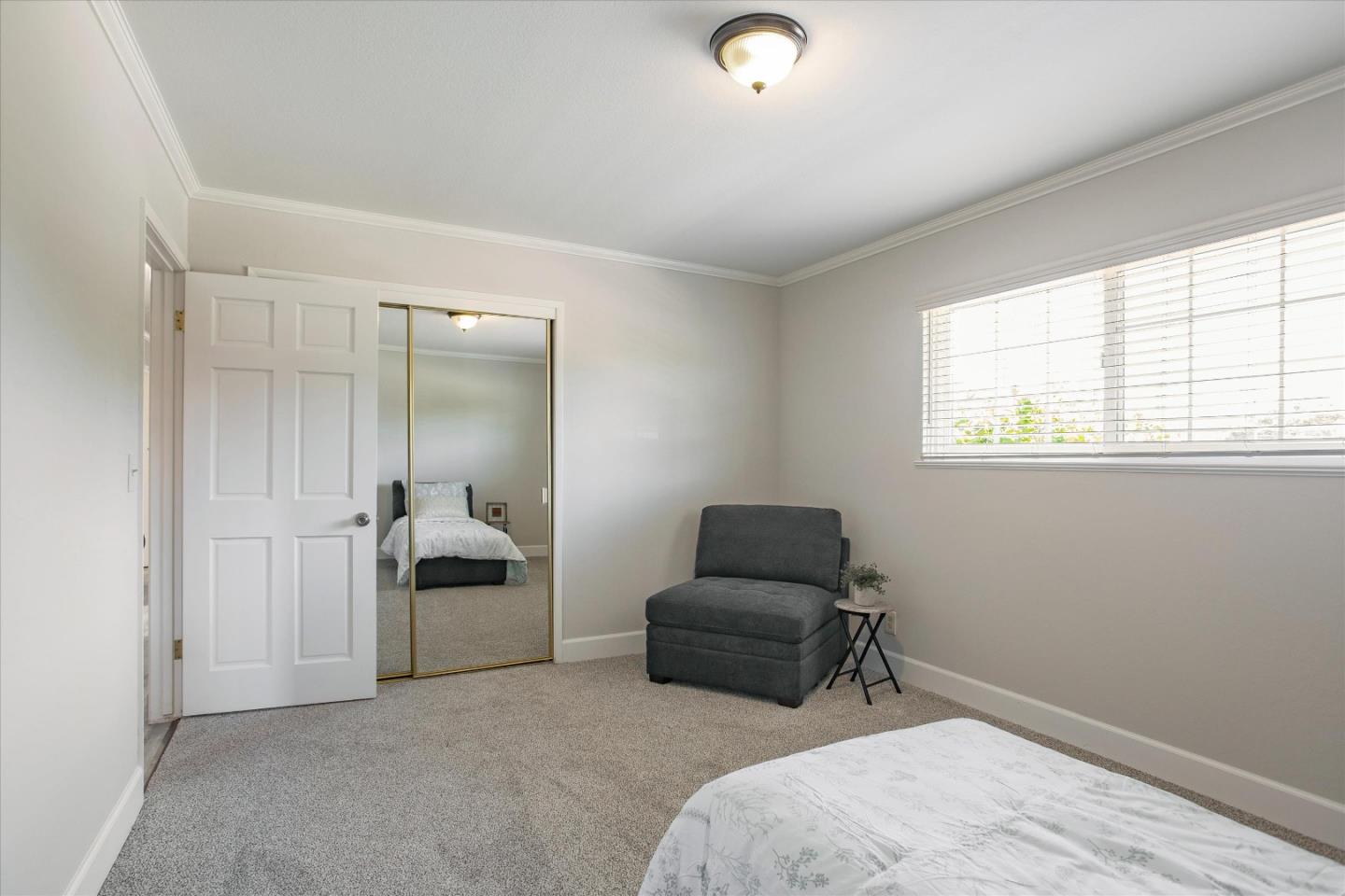 1001 Tweed Street Seaside, CA 93955 - Photo 22 of 35 a bedroom with bed and a window