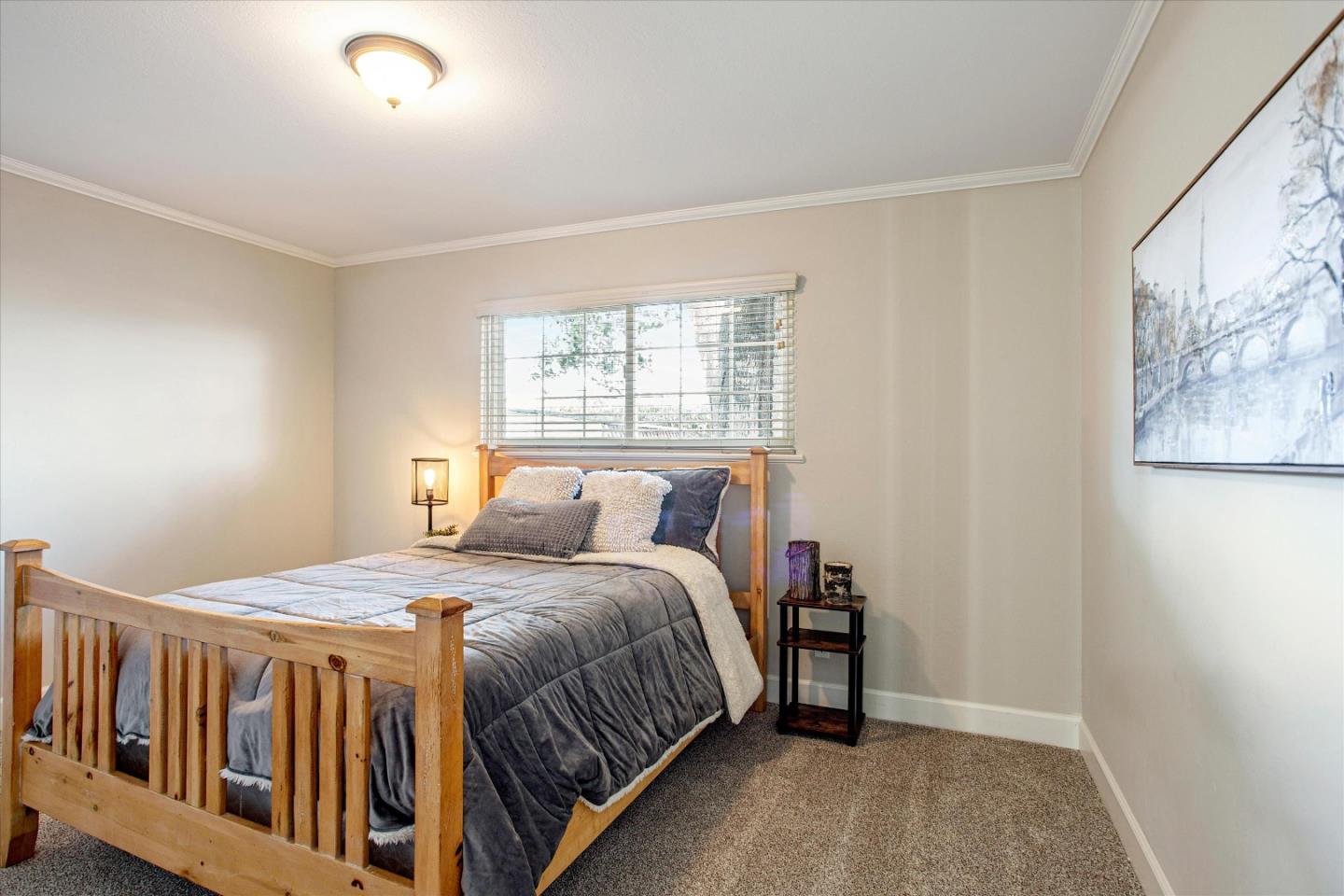 1001 Tweed Street Seaside, CA 93955 - Photo 27 of 35 a bedroom with a bed and a window