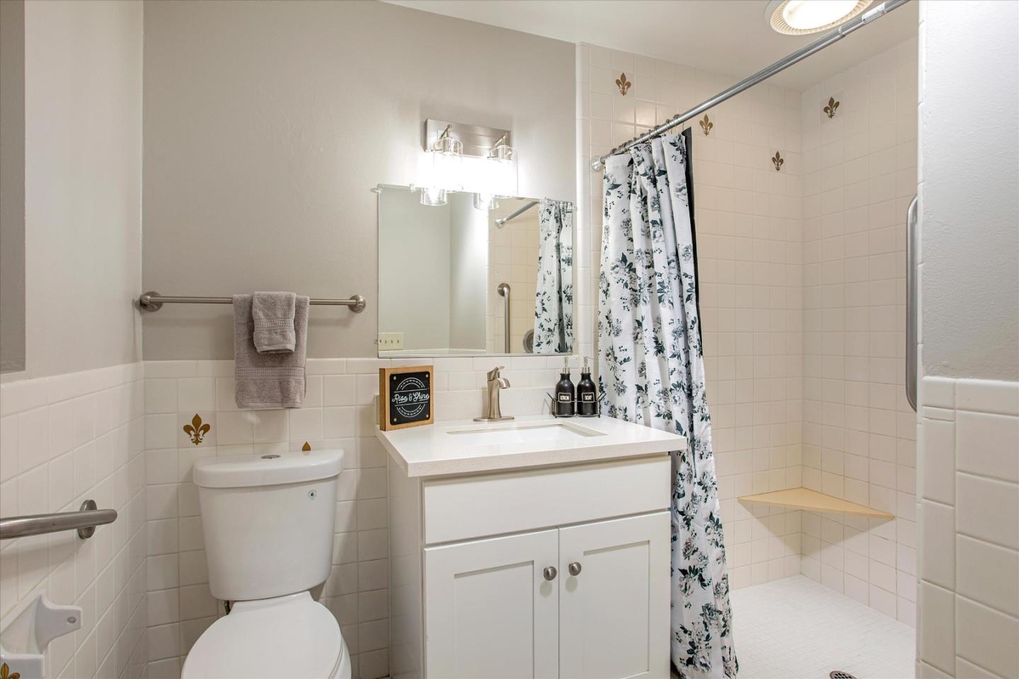 1001 Tweed Street Seaside, CA 93955 - Photo 28 of 35 a bathroom with a sink toilet and shower