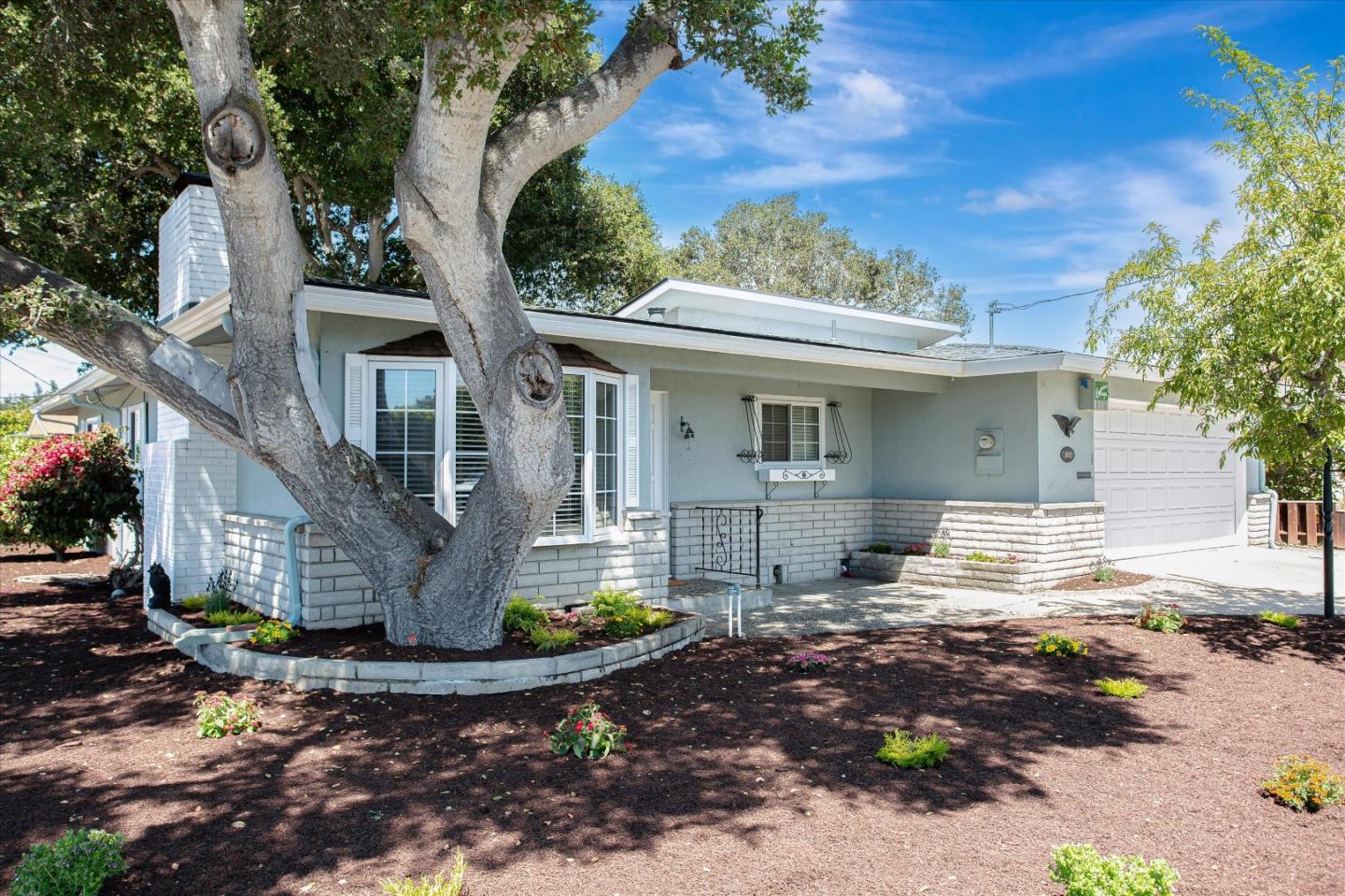 1001 Tweed Street Seaside, CA 93955 - Photo 3 of 35 a front view of a house with garden
