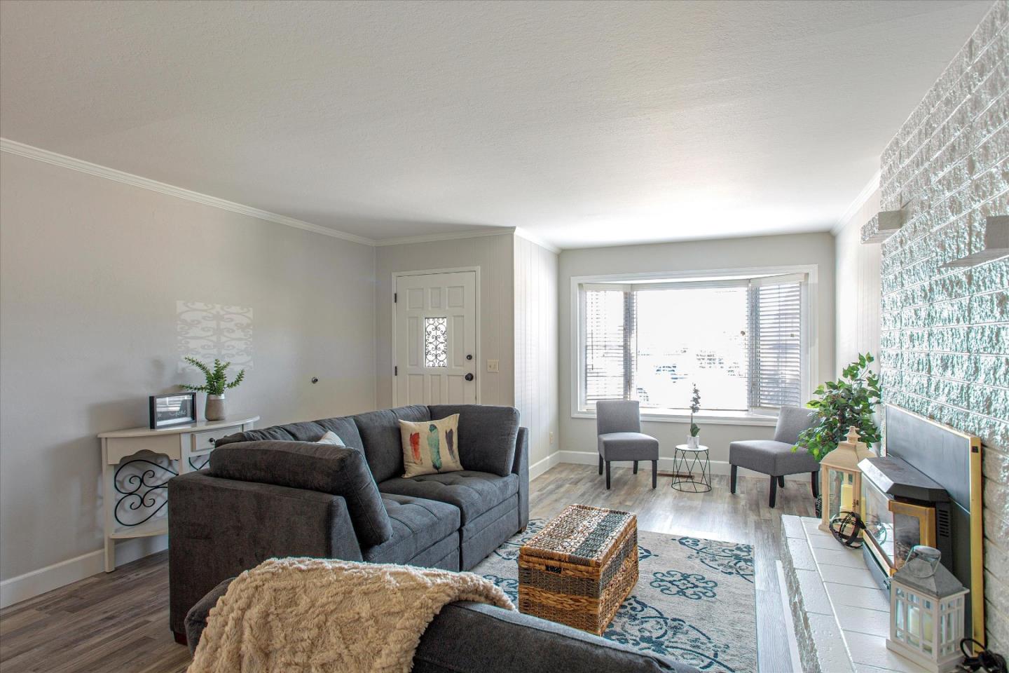 1001 Tweed Street Seaside, CA 93955 - Photo 7 of 35 a living room with furniture and a large window