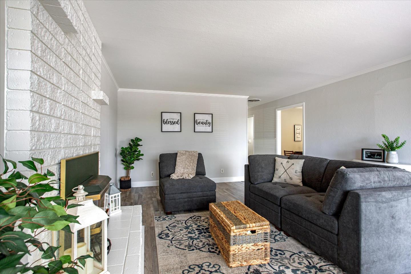 1001 Tweed Street Seaside, CA 93955 - Photo 10 of 35 a living room with furniture a couch and a potted plant