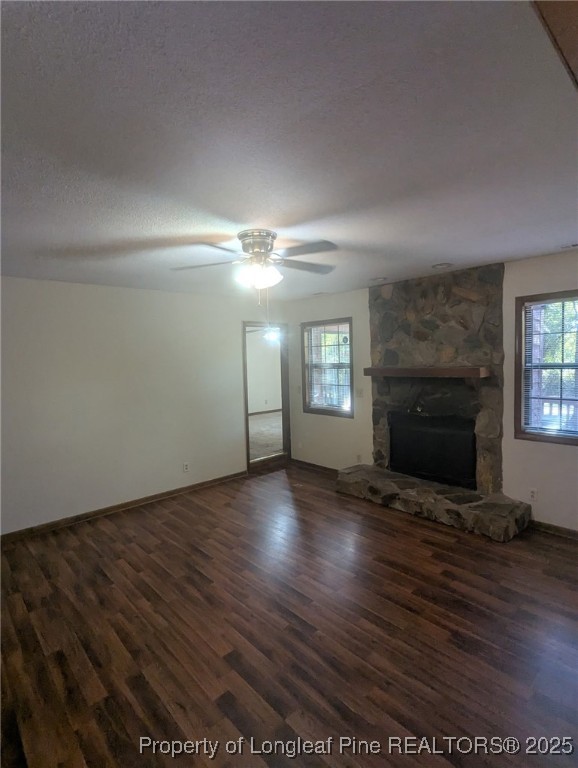 350 Montana Lane Spring Lake, NC 28390 - Photo 8 of 34 an empty room with wooden floor fireplace and windows