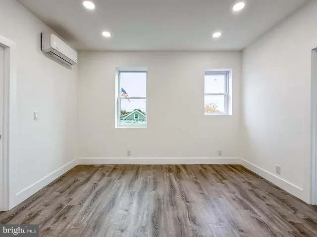 a bathroom with a toilet a sink and bathtub