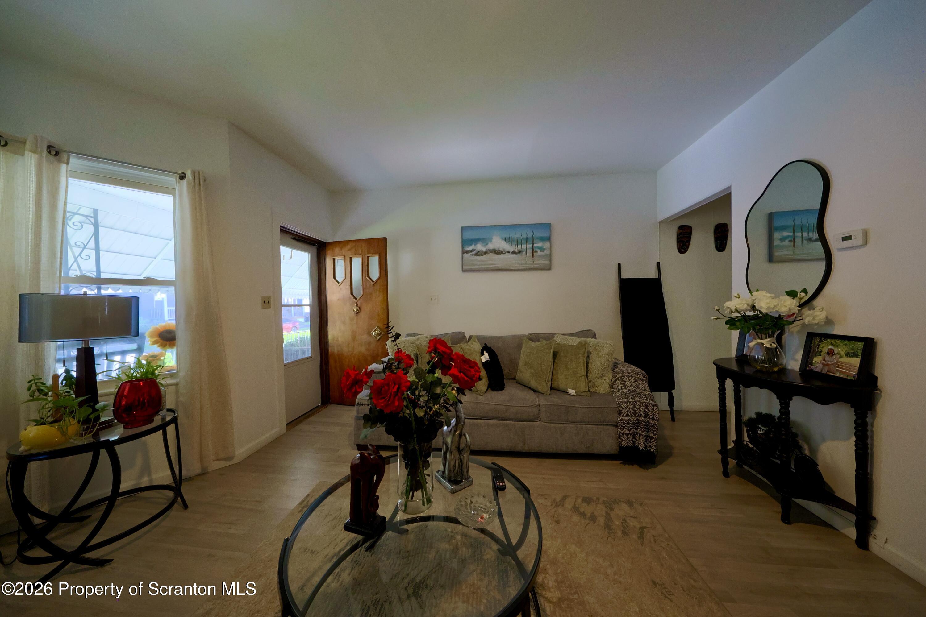 1016-1018 Diamond Avenue Scranton, PA 18508 - Photo 3 of 15 a view of a livingroom with furniture and furniture