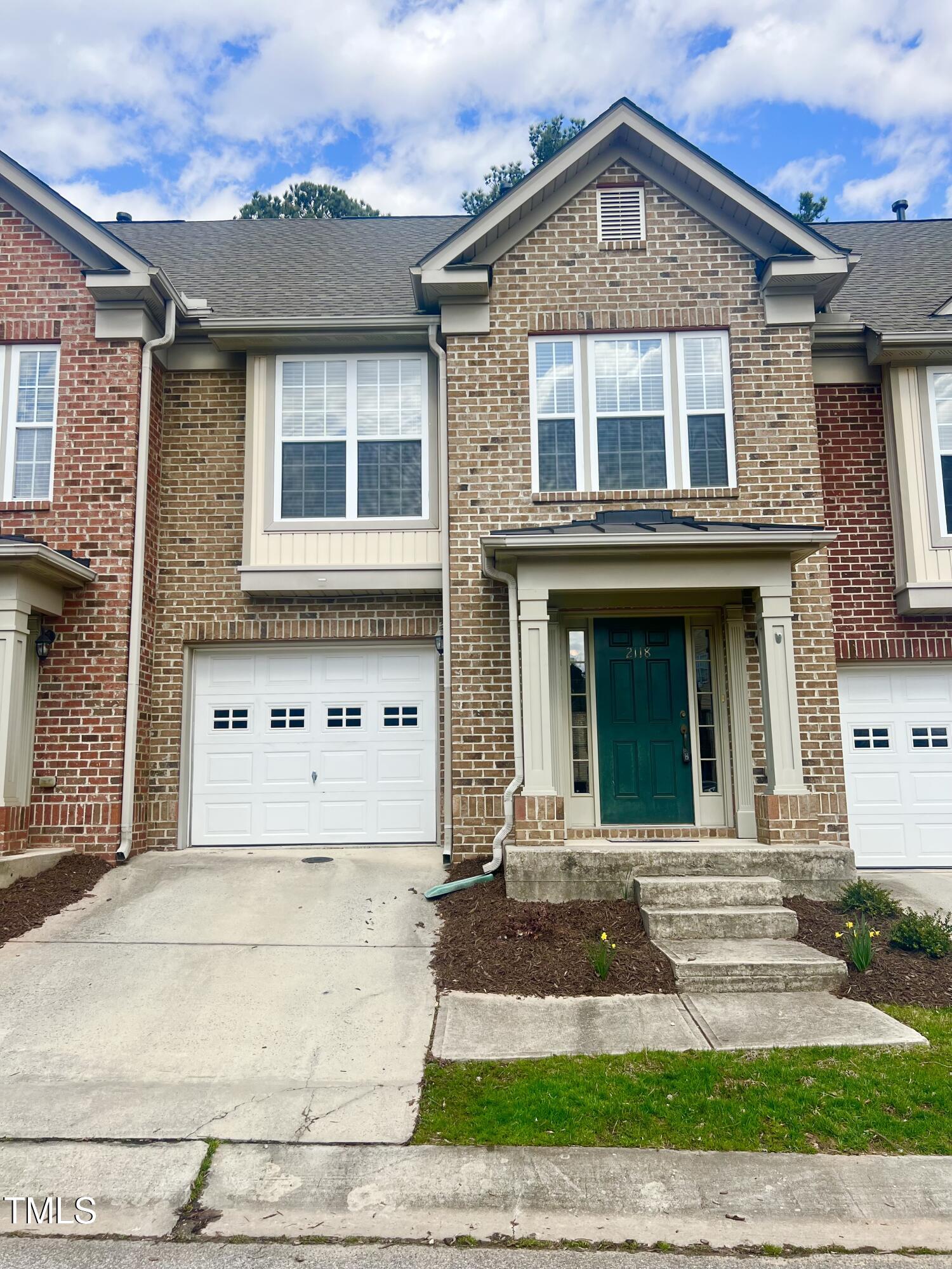 2118 Kedvale Avenue Raleigh, NC 27617 - Photo 1 of 17 a front view of a house