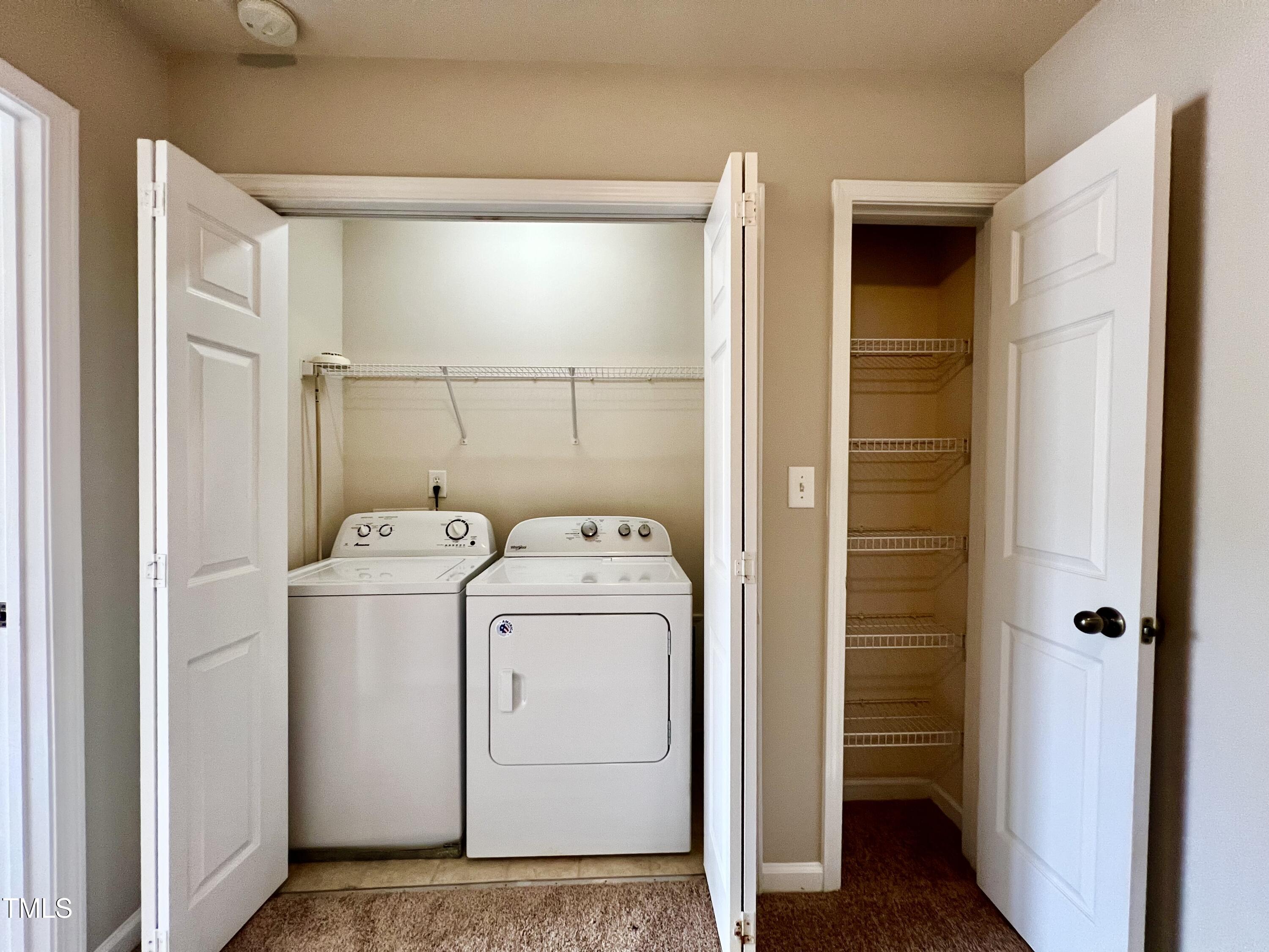 2118 Kedvale Avenue Raleigh, NC 27617 - Photo 12 of 17 a utility room with dryer and washer