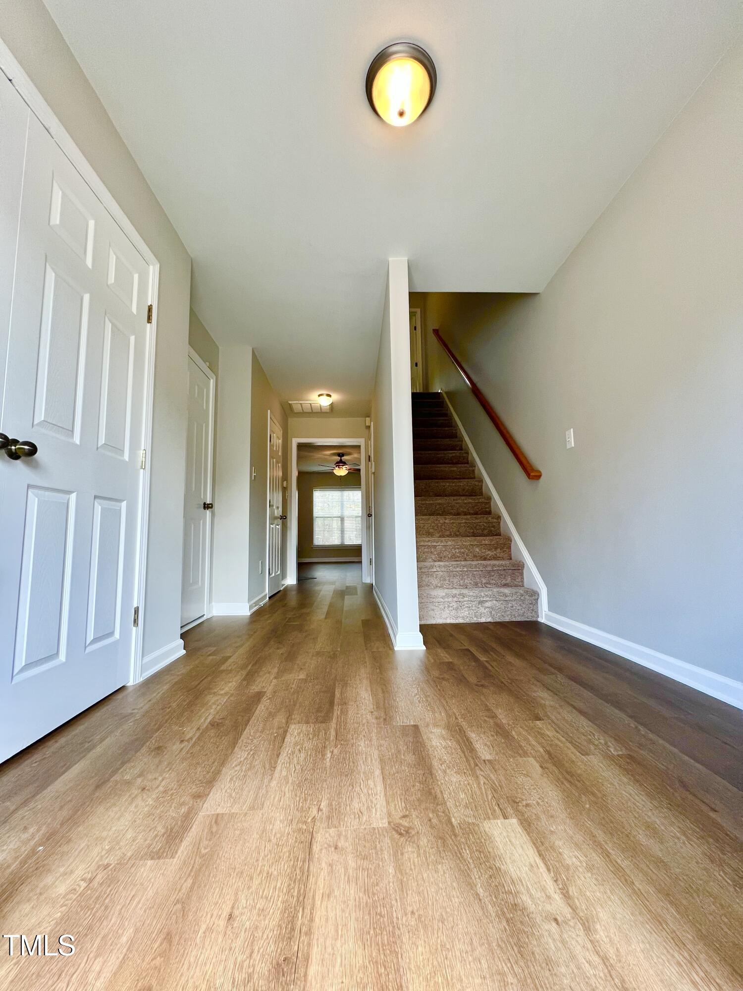 2118 Kedvale Avenue Raleigh, NC 27617 - Photo 2 of 17 a view of a room with wooden floor and entryway