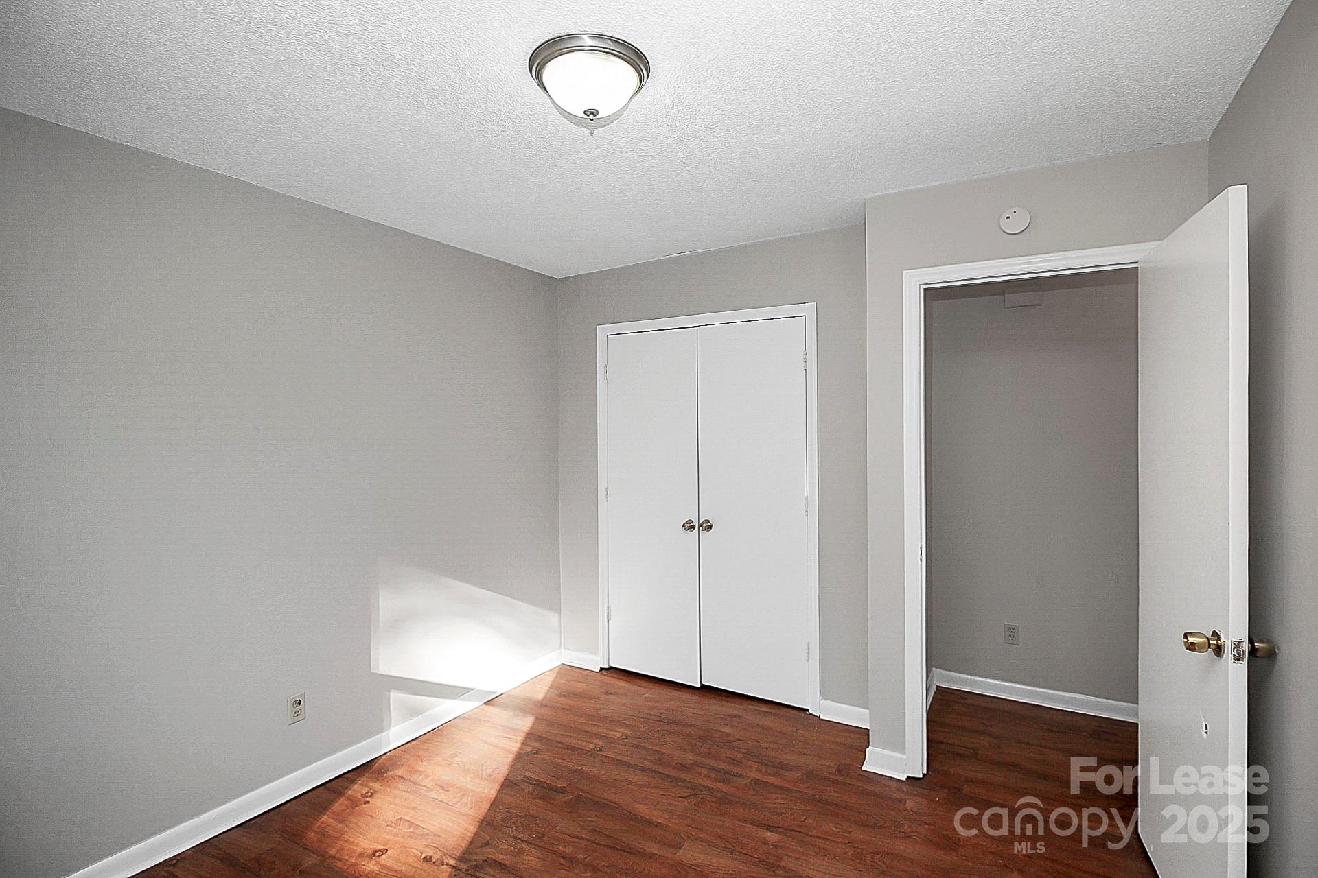 501 North Ransom Street, Unit C Gastonia, NC 28052 - Photo 15 of 19 a view of livingroom with wooden floor
