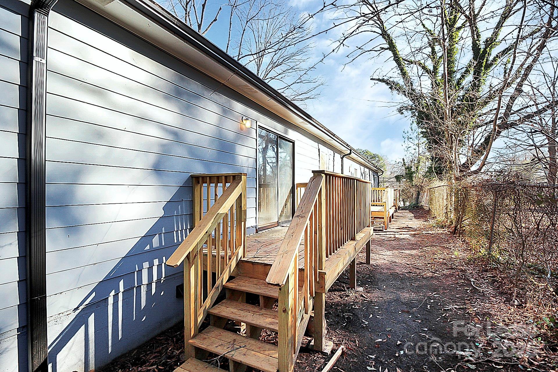 501 North Ransom Street, Unit C Gastonia, NC 28052 - Photo 19 of 19 a view of a house with a yard