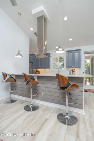a kitchen with stainless steel appliances granite countertop a stove and a sink