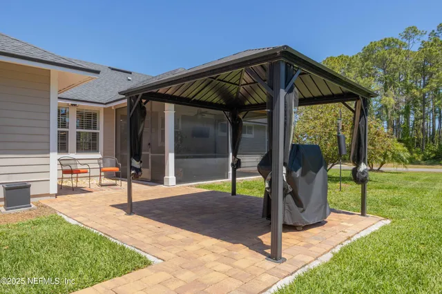 a view of a kitchen cabinets and a wooden floor