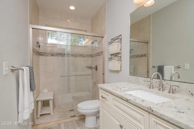 a view of a street with a tree