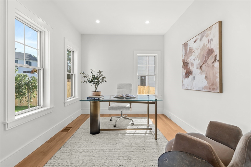 133 Lawton Road Needham, MA 02492 - Photo 11 of 36 a living room with furniture and a window
