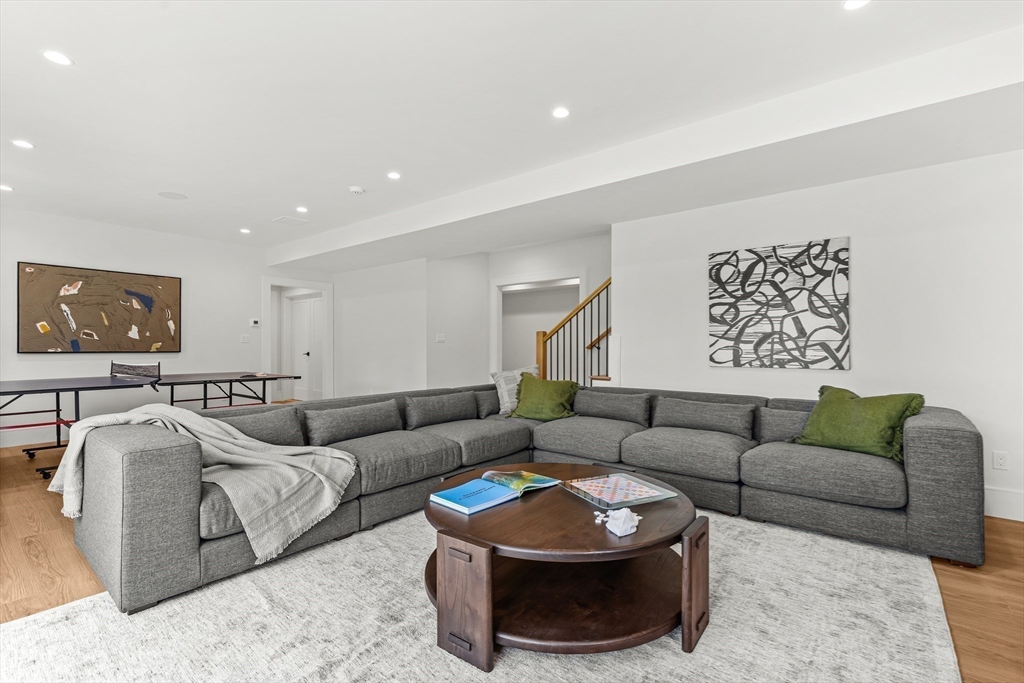 133 Lawton Road Needham, MA 02492 - Photo 28 of 36 a living room with furniture and a couch