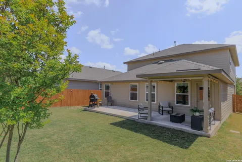 a view of a house with furniture and porch