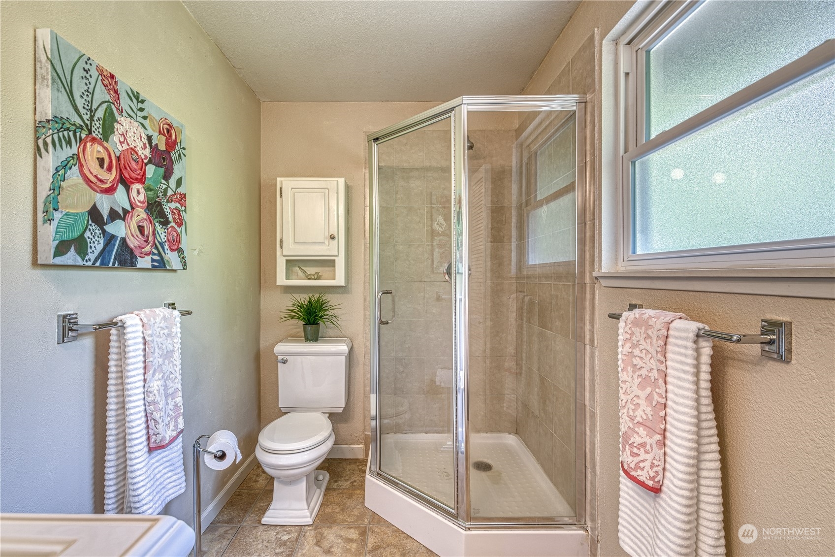 7720 Insel Avenue Gig Harbor, WA 98335 - Photo 22 of 29 a bathroom with a toilet and a shower