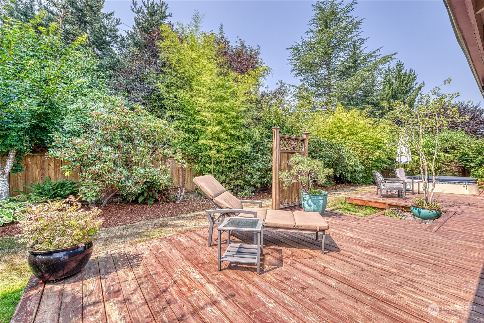7720 Insel Avenue Gig Harbor, WA 98335 - Photo 25 of 29 a swimming pool with barbeque oven and outdoor seating