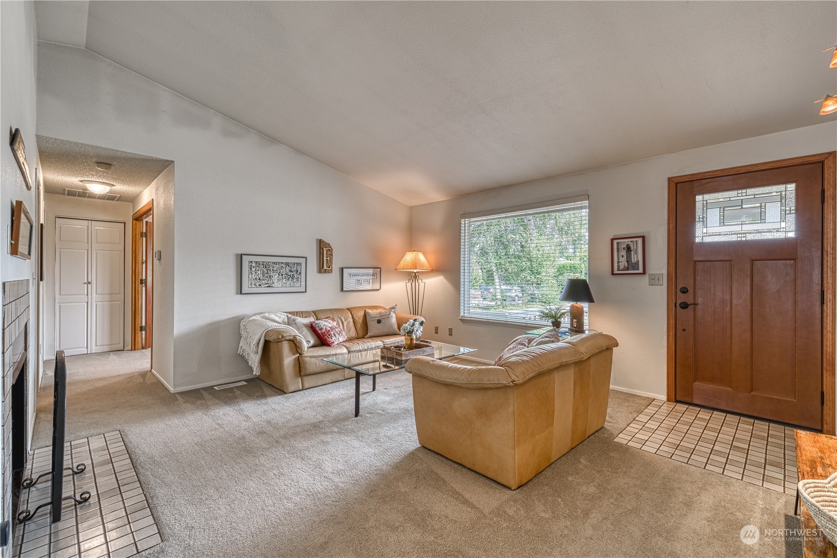 7720 Insel Avenue Gig Harbor, WA 98335 - Photo 4 of 29 a living room with furniture and a window