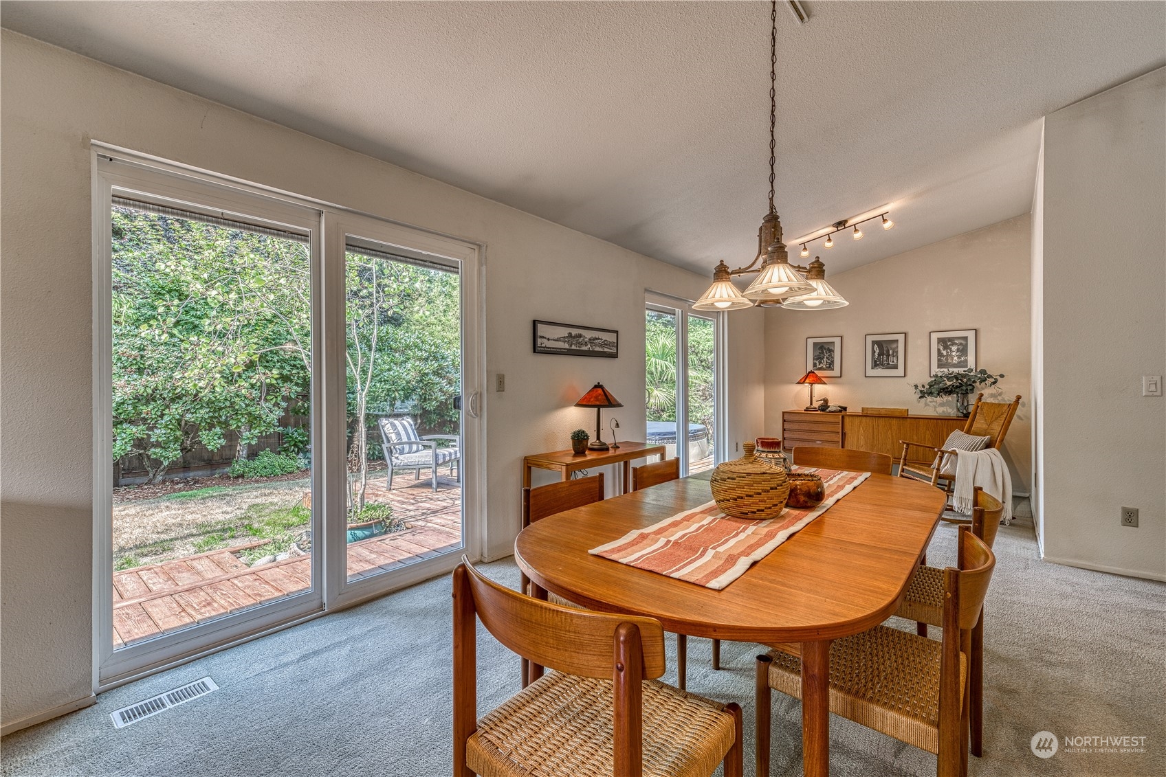 7720 Insel Avenue Gig Harbor, WA 98335 - Photo 9 of 29 a view of a dining room with furniture window and outside view