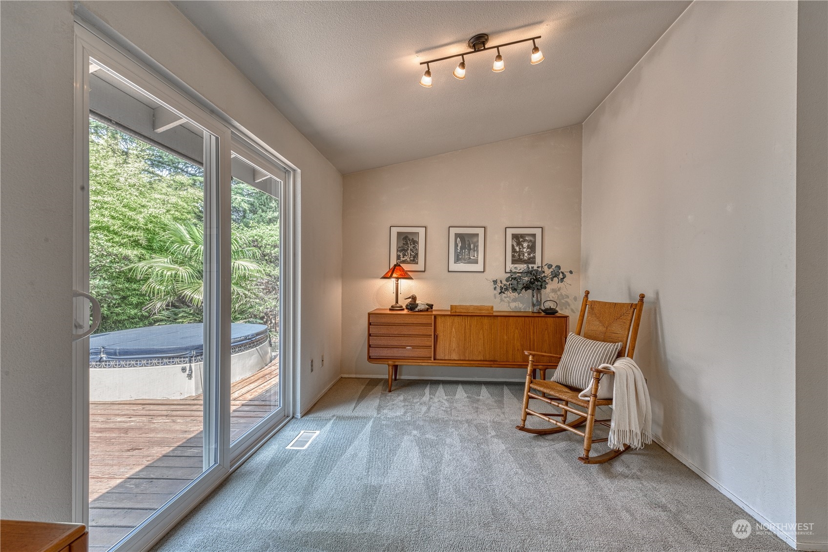 7720 Insel Avenue Gig Harbor, WA 98335 - Photo 10 of 29 a view of a workspace with furniture and a window