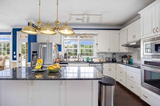 219 Broken Rock Road Hamilton, GA 31811 - Photo 12 of 44 a kitchen with counter top space appliances and cabinets