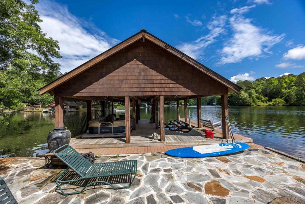 219 Broken Rock Road Hamilton, GA 31811 - Photo 30 of 44 a view of a house with backyard water fountain and sitting area