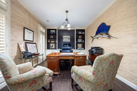 a view of a livingroom with furniture and window