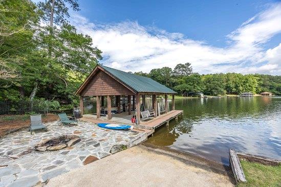 219 Broken Rock Road Hamilton, GA 31811 - Photo 32 of 44 a view of house with outdoor seating area and roof