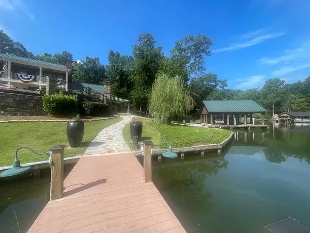 a view of a swimming pool with a patio