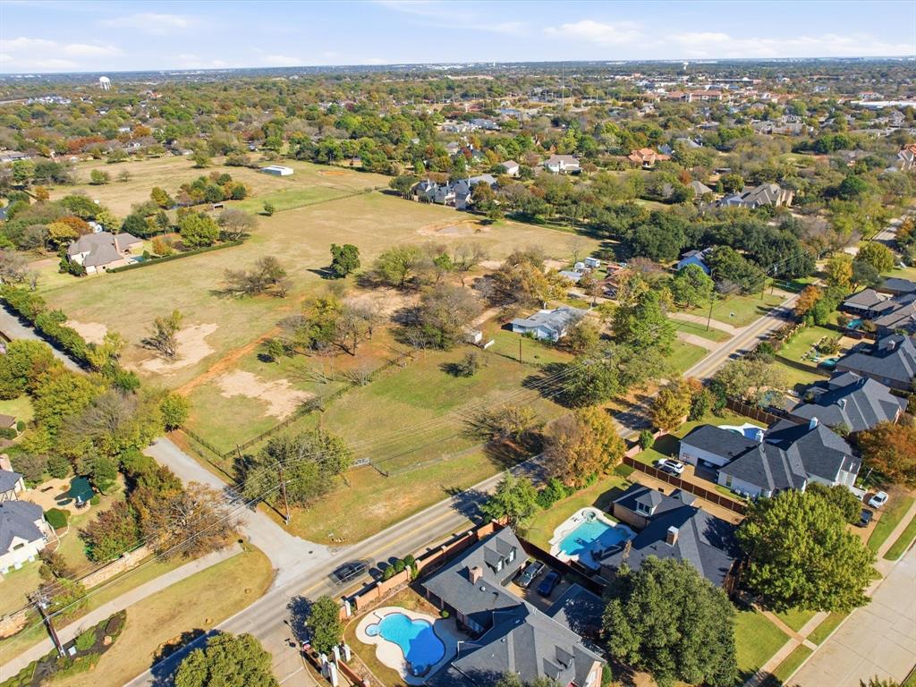 108 Glade Road Colleyville, TX 76034 - Photo 2 of 7 an aerial view of residential houses with outdoor space